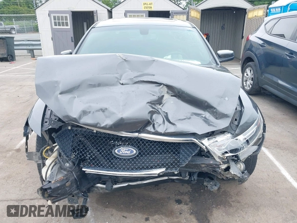 2015 Ford Taurus SEL with VIN 1FAHP2E81FG163058, listed as a IAAI auction lot 42221098 with 127,957 mi miles and . Bid and sale history available at carsss.com. Image 12.
