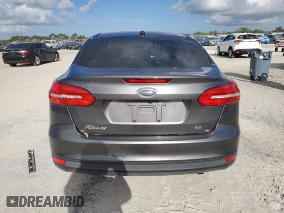2018 Ford Focus SE with VIN 1FADP3F21JL298832, listed as a Copart auction lot 61262655 with 122,331 mi miles and Clean title. Bid and sale history available at DreamBid. Image 6.