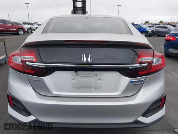 2018 Honda Clarity Touring with VIN JHMZC5F32JC014588, listed as a IAAI auction lot 42066633 with 89,316 mi miles. Bid and sale history available at carsss.com. Image 17.