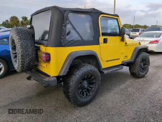 2003 Jeep Wrangler Sport with VIN 1J4FA49S93P373532, listed as a Copart auction lot 74595774 with 105,018 mi miles and Non Repairable. Bid and sale history available at carsss.com. Image 3.