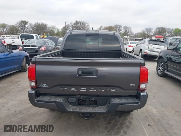 2018 Toyota Tacoma SR with VIN 5TFCZ5AN6JX127774, listed as a IAAI auction lot 41801158 with 28,161 mi miles and . Bid and sale history available at DreamBid. Image 16.