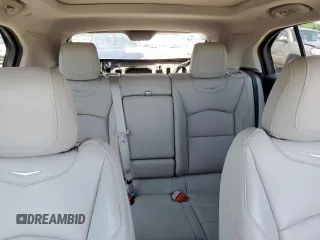 2023 Cadillac XT4 FWD Luxury z VIN 1GYAZAR42PF102696, wystawiony jako Copart lot #60524065 z przebiegiem 1 903 mil mil oraz Szkoda całkowita • Salvage title. Historia ofert i sprzedaży dostępna na DreamBid. Obrazek 10.