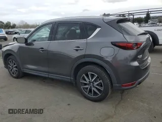 2018 Mazda CX-5 S Premium with VIN JM3KFBDM1J1352233, listed as a Copart auction lot 47082655 with 70,350 mi miles and Salvage Title. Bid and sale history available at DreamBid. Image 2.