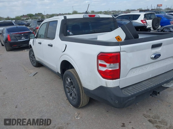 2023 Ford Maverick XL with VIN 3FTTW8E96PRA74020, listed as a IAAI auction lot 41782011 with 30,592 mi miles and . Bid and sale history available at DreamBid. Image 3.