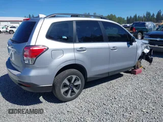 2018 Subaru Forester with VIN JF2SJABC1JH460789, listed as a IAAI auction lot 42631854 with 86,215 mi miles and . Bid and sale history available at DreamBid. Image 4.