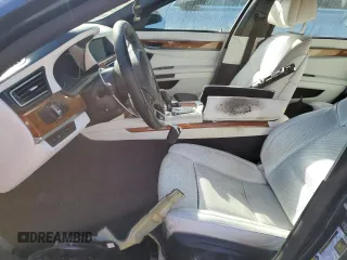 2015 BMW 7 Series 750Li xDrive with VIN WBAYF8C58FD654184, listed as a Copart auction lot 77203184 with 122,955 mi miles and Non Repairable. Bid and sale history available at DreamBid. Image 7.
