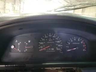 1995 Nissan Frontier with VIN 1N6SD11S6SC434201, listed as a Copart auction lot 60198815 with 222,938 mi miles and Salvage title. Bid and sale history available at DreamBid. Image 9.