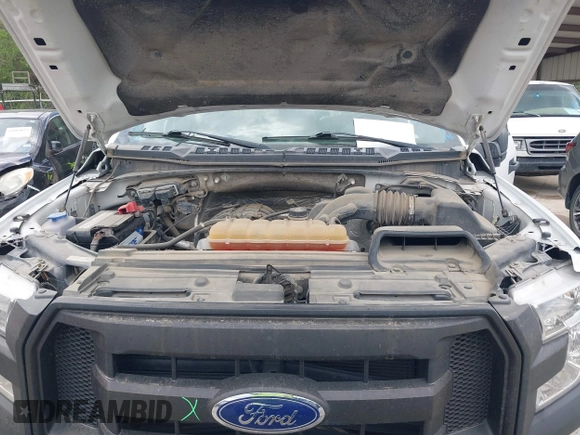 2015 Ford F-150 XL with VIN 1FTMF1E84FKD12758, listed as a IAAI auction lot 41841584 with 59,950 mi miles and . Bid and sale history available at DreamBid. Image 10.