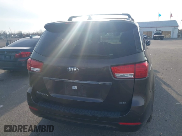2016 Kia Sedona EX with VIN KNDMC5C1XG6159271, listed as a IAAI auction lot 41409277 with 95,696 mi miles. Bid and sale history available at carsss.com. Image 16.