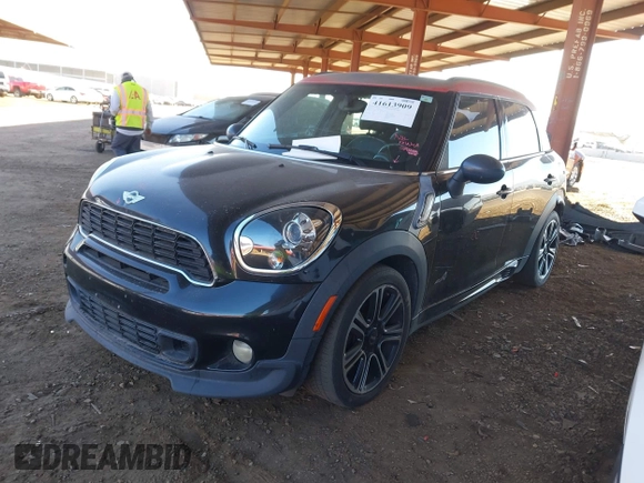 2014 MINI Countryman S with VIN WMWZC5C57EWP39919, listed as a IAAI auction lot 41613909 with 139,138 mi miles and . Bid and sale history available at DreamBid. Image 18.