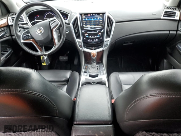 2015 Cadillac SRX Performance Collection with VIN 3GYFNCE38FS597717, listed as a Copart auction lot 57629615 with 102,689 mi miles and Salvage title. Bid and sale history available at DreamBid. Image 8.