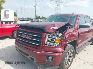 2014 GMC Sierra 1500 SLT with VIN 3GTU2VEC8EG100328, listed as a IAAI auction lot 41867831 with 193,148 mi miles and . Bid and sale history available at DreamBid. Image 6.