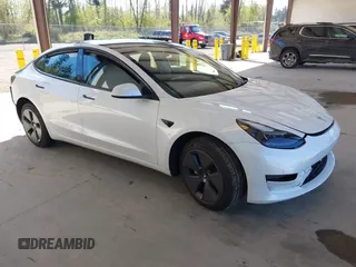 2023 Tesla Model 3 with VIN 5YJ3E1EA5PF610431, listed as a IAAI auction lot 42087181 with 19,777 mi miles. Bid and sale history available at carsss.com. Image 1.