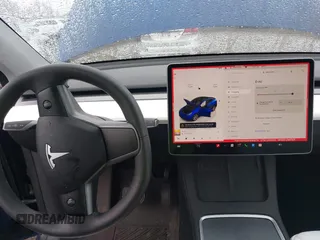 2023 Tesla Model Y Long Range z VIN 7SAYGDEE2PF694974, wystawiony jako IAAI lot #41814582 z przebiegiem 31 726 mil mil oraz . Historia ofert i sprzedaży dostępna na DreamBid. Obrazek 18.