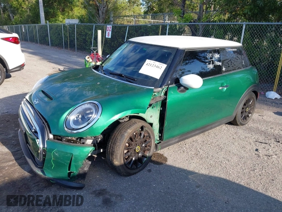 2022 MINI Hardtop Cooper SE with VIN WMW13DJ04N2S26388, listed as a IAAI auction lot 42123462 with 23,129 mi miles and . Bid and sale history available at DreamBid. Image 18.