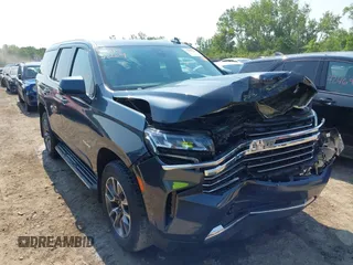 2021 Chevrolet Tahoe LT z VIN 1GNSKNKD8MR102008, wystawiony jako IAAI lot #42453264 z przebiegiem 61 161 mil mil oraz . Historia ofert i sprzedaży dostępna na DreamBid. Obrazek 1.