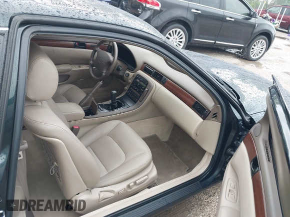 1992 Lexus SC with VIN JT8JZ31C6N0006525, listed as a IAAI auction lot 42412882 with 88,541 mi miles and . Bid and sale history available at DreamBid. Image 5.