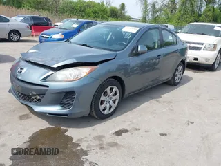 2012 Mazda 3 i Sport with VIN JM1BL1UF1C1548558, listed as a IAAI auction lot 42113245 with 143,667 mi miles and . Bid and sale history available at DreamBid. Image 2.