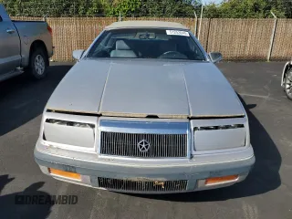1992 Chrysler LeBaron z VIN 1C3X44539NF136763, wystawiony jako Copart lot #51253645 z przebiegiem 73 364 mil mil oraz Czysty tytuł • Clean title. Historia ofert i sprzedaży dostępna na DreamBid. Obrazek 5.
