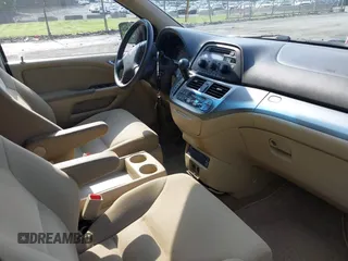 2010 Honda Odyssey EX with VIN 5FNRL3H59AB103405, listed as a IAAI auction lot 42442253 with 129,784 mi miles and . Bid and sale history available at DreamBid. Image 5.