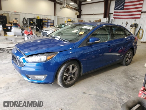 2018 Ford Focus SE z VIN 1FADP3FE2JL332464, wystawiony jako Copart lot #55649215 z przebiegiem 95 541 mil mil oraz Czysty tytuł • Clean title. Historia ofert i sprzedaży dostępna na DreamBid. Obrazek 1.