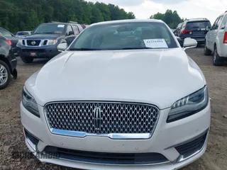 2019 Lincoln MKZ Reserve II z VIN 3LN6L5E94KR607412, wystawiony jako IAAI lot #42231994 z przebiegiem 54 812 mil mil oraz . Historia ofert i sprzedaży dostępna na DreamBid. Obrazek 12.