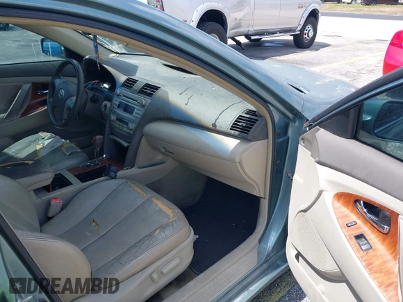 2010 Toyota Camry with VIN 4T1BF3EKXAU555983, listed as a IAAI auction lot 42112803 with 125,061 mi miles and . Bid and sale history available at DreamBid. Image 5.