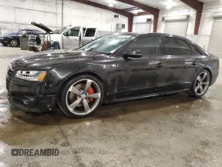 2017 Audi A8 Sport z VIN WAU43AFD5HN005666, wystawiony jako Copart lot #58791885 z przebiegiem 98 700 mil mil oraz Szkoda całkowita • Salvage title. Historia ofert i sprzedaży dostępna na DreamBid. Obrazek 1.