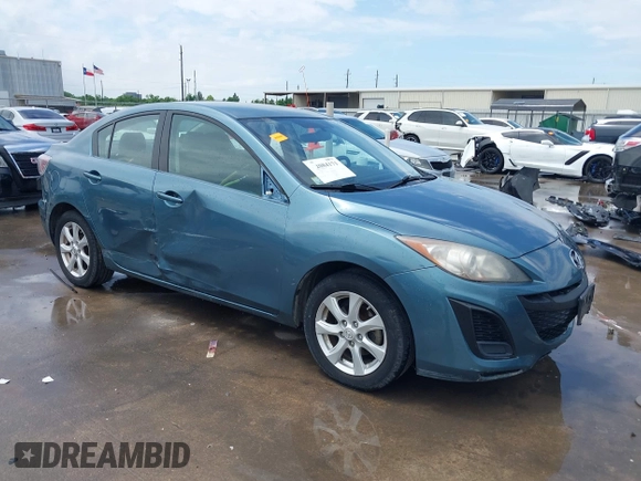2011 Mazda 3 i Touring with VIN JM1BL1VG2B1425700, listed as a IAAI auction lot 42084171 with 162,310 mi miles. Bid and sale history available at carsss.com. Image 1.