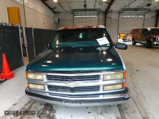 1999 Chevrolet Tahoe with VIN 1GNEC13R9XJ536325, listed as a IAAI auction lot 41475643 with 206,804 mi miles. Bid and sale history available at carsss.com. Image 6.