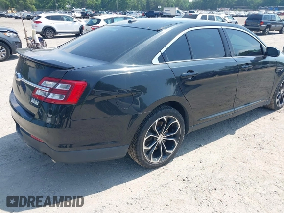 2015 Ford Taurus SHO with VIN 1FAHP2KT8FG166614, listed as a IAAI auction lot 42613481 with 97,361 mi miles and . Bid and sale history available at DreamBid. Image 4.