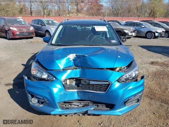 2017 Subaru Impreza Premium with VIN 4S3GTAD60H3712240, listed as a IAAI auction lot 40773945 with 133,146 mi miles. Bid and sale history available at carsss.com. Image 12.