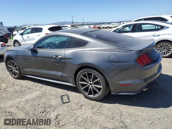 2018 Ford Mustang EcoBoost z VIN 1FA6P8TH3J5129320, wystawiony jako Copart lot #57812415 z przebiegiem 52 841 mil mil oraz Szkoda całkowita • Salvage title. Historia ofert i sprzedaży dostępna na DreamBid. Obrazek 2.