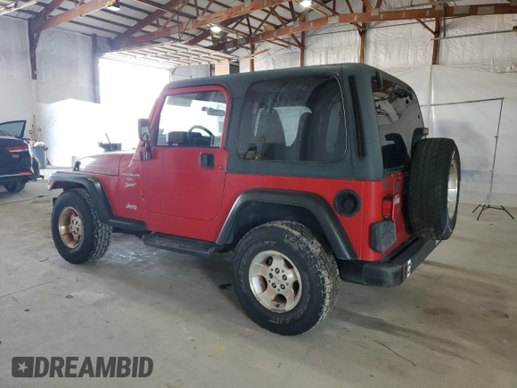 2000 Jeep Wrangler Sport with VIN 1J4FA49S9YP751596, listed as a Copart auction lot 52527315 with 132,514 mi miles and Clean Title. Bid and sale history available at carsss.com. Image 2.