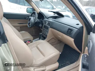 2003 Subaru Forester XS with VIN JF1SG65683H734188, listed as a IAAI auction lot 41584619 with 242,536 mi miles. Bid and sale history available at carsss.com. Image 5.