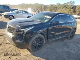 2021 Cadillac XT4 FWD Luxury z VIN 1GYAZAR4XMF066381, wystawiony jako Copart lot #84615464 z przebiegiem 80 018 mil mil oraz Szkoda całkowita • Salvage title. Historia ofert i sprzedaży dostępna na DreamBid. Obrazek 1.