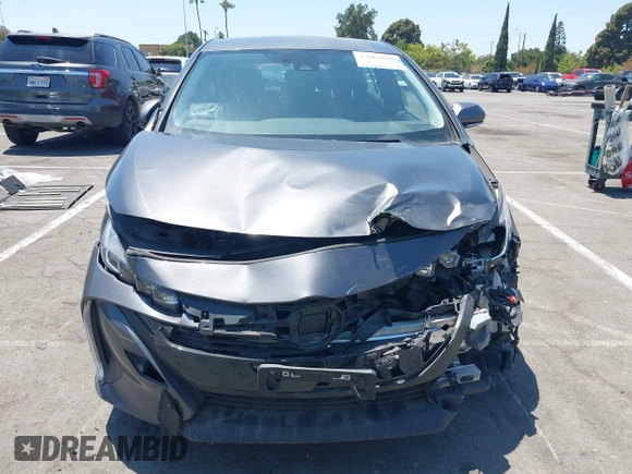 2021 Toyota Prius LE with VIN JTDKAMFPXM3170372, listed as a IAAI auction lot 42661609 with 47,977 mi miles and . Bid and sale history available at DreamBid. Image 12.