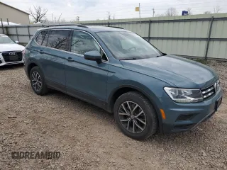 2019 Volkswagen Tiguan SE with VIN 3VV2B7AX0KM132572, listed as a Copart auction lot 54511475 with 65,394 mi miles and Salvage Title. Bid and sale history available at DreamBid. Image 4.