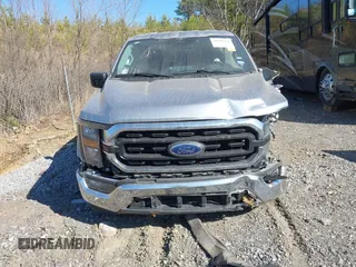 2023 Ford F-150 XL with VIN 1FTEW1C80PKE77571, listed as a IAAI auction lot 41648122 with 49,196 mi miles and . Bid and sale history available at DreamBid. Image 13.