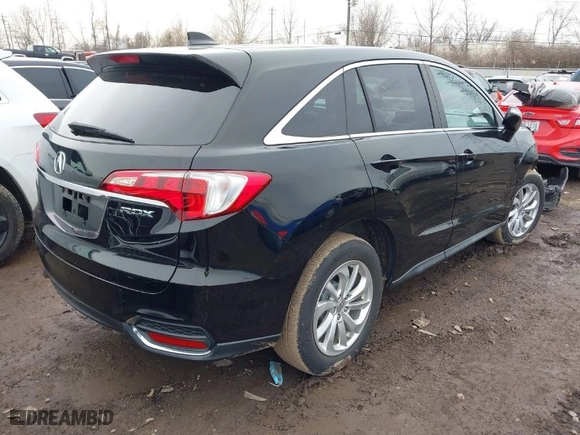2016 Acura RDX with VIN 5J8TB3H39GL009247, listed as a IAAI auction lot 41590281 with 100,639 mi miles. Bid and sale history available at carsss.com. Image 4.