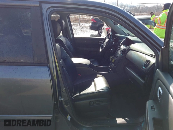 2013 Honda Pilot EX-L with VIN 5FNYF4H67DB035594, listed as a IAAI auction lot 41661166 with 133,950 mi miles and . Bid and sale history available at carsss.com. Image 5.