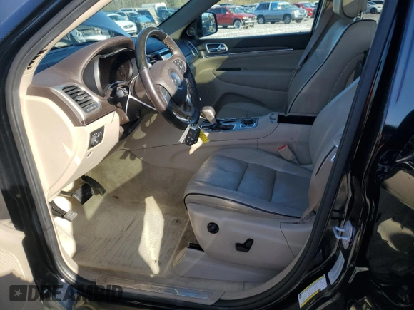 2017 Jeep Grand Cherokee Overland z VIN 1C4RJFCG9HC663433, wystawiony jako Copart lot #49231665 z przebiegiem 171 721 mil mil oraz Szkoda całkowita • Salvage title. Historia ofert i sprzedaży dostępna na DreamBid. Obrazek 7.