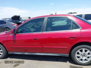 2002 Honda Accord SE z VIN 1HGCG56742A087457, wystawiony jako IAAI lot #42397581 z przebiegiem 187 534 mil mil oraz . Historia ofert i sprzedaży dostępna na DreamBid. Obrazek 14.