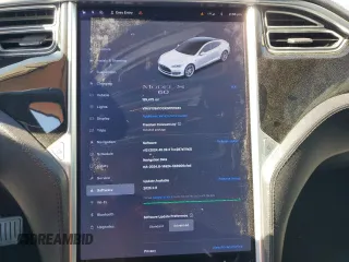 2013 Tesla Model S with VIN 5YJSA1CGXDFP21051, listed as a Copart auction lot 48377775 with 125,472 mi miles and Salvage Title. Bid and sale history available at carsss.com. Image 9.