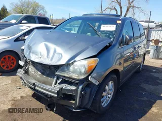 2010 Honda Odyssey EX-L with VIN 5FNRL3H64AB025785, listed as a IAAI auction lot 41889078 with 199,714 mi miles. Bid and sale history available at carsss.com. Image 2.