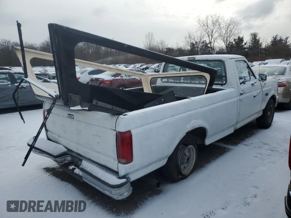 1992 Ford F-150 with VIN 2FTDF15Y5NCA31541, listed as a Copart auction lot 85058754 with 138,467 mi miles and Salvage Title. Bid and sale history available at carsss.com. Image 3.