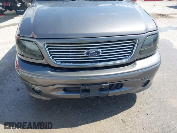 2002 Ford F-150 Harley Davidson with VIN 1FTRW07392KE11409, listed as a IAAI auction lot 41877998 with 148,476 mi miles. Bid and sale history available at carsss.com. Image 6.