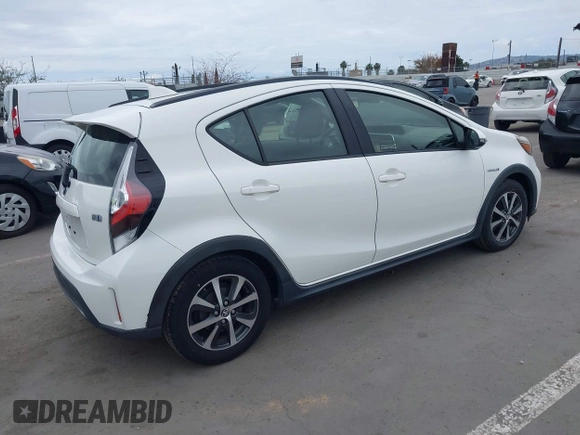 2018 Toyota Prius One with VIN JTDKDTB37J1615520, listed as a IAAI auction lot 42054113 with 76,989 mi miles and . Bid and sale history available at DreamBid. Image 4.