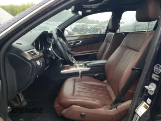 2014 Mercedes-Benz E 350 Luxury with VIN WDDHF8JB4EB041300, listed as a Copart auction lot 57024765 with 124,673 mi miles and Clean title. Bid and sale history available at DreamBid. Image 7.