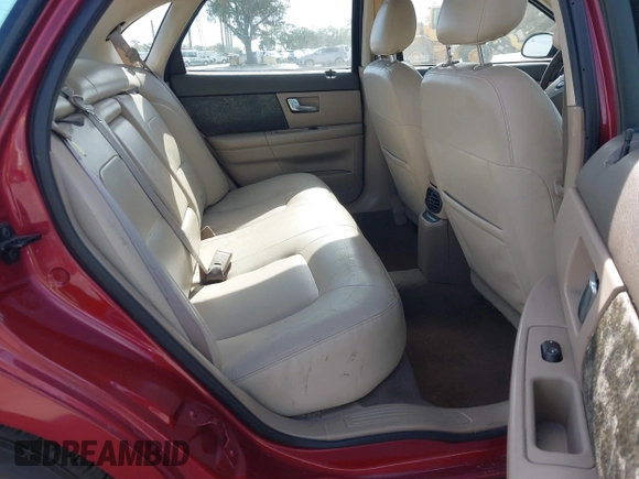 2002 Ford Taurus SES Standard with VIN 1FAFP55S42A135871, listed as a IAAI auction lot 40822596 with 185,605 mi miles. Bid and sale history available at carsss.com. Image 8.